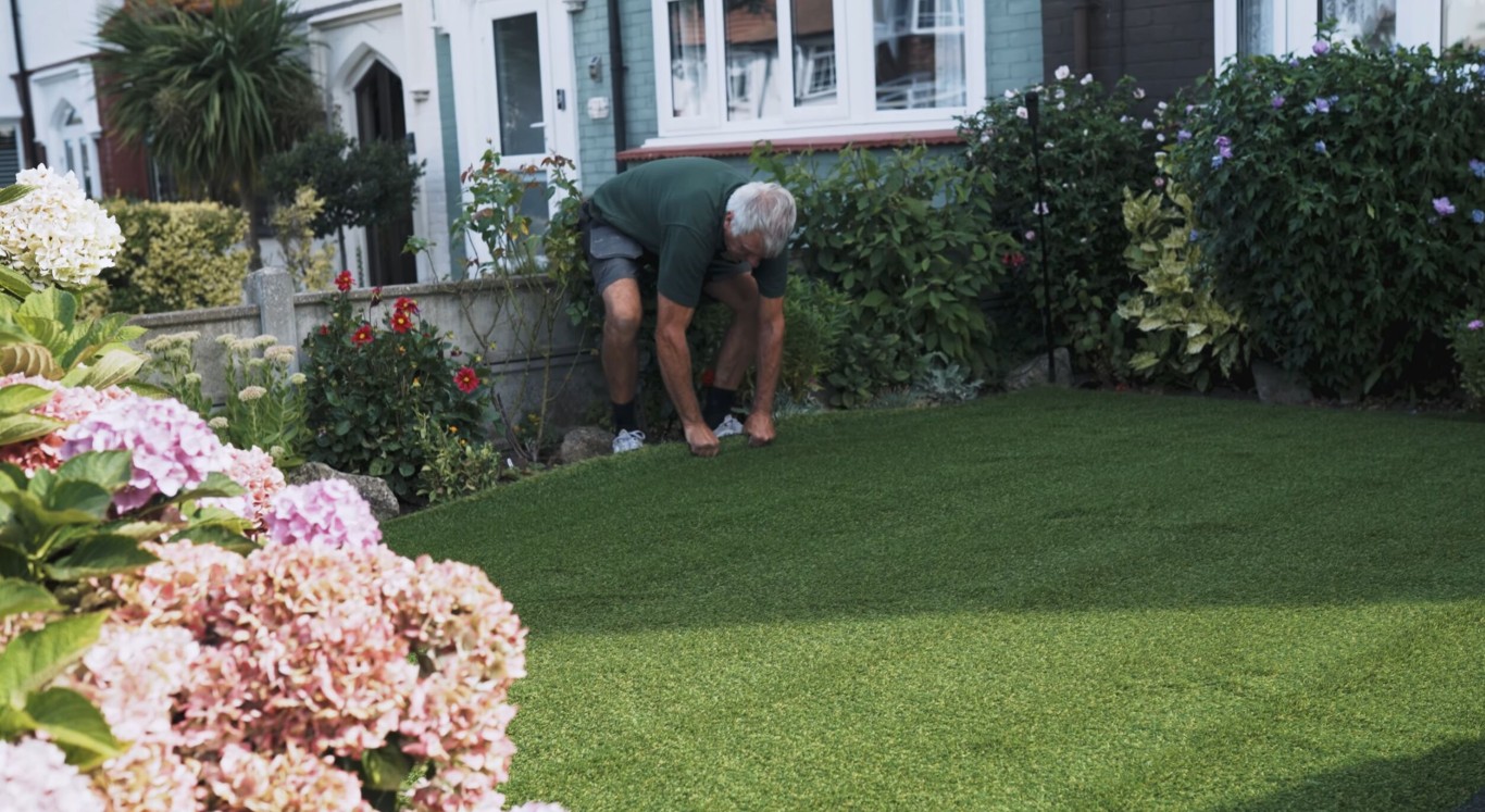 Eco-friendly artificial grass installation showing water conservation benefits in Des Plaines, IL